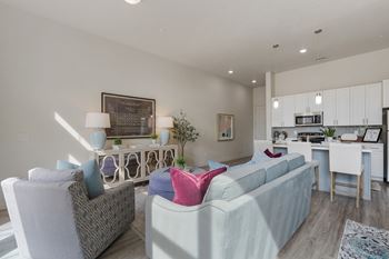 Living room with couch and kitchen view4